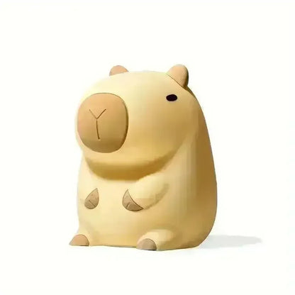 https://cdn.shopify.com/s/files/1/0803/3622/4575/files/buy-3d-silicon-capybara-night-lamp-at-bear-hugs-21010.webp?v=1771000305