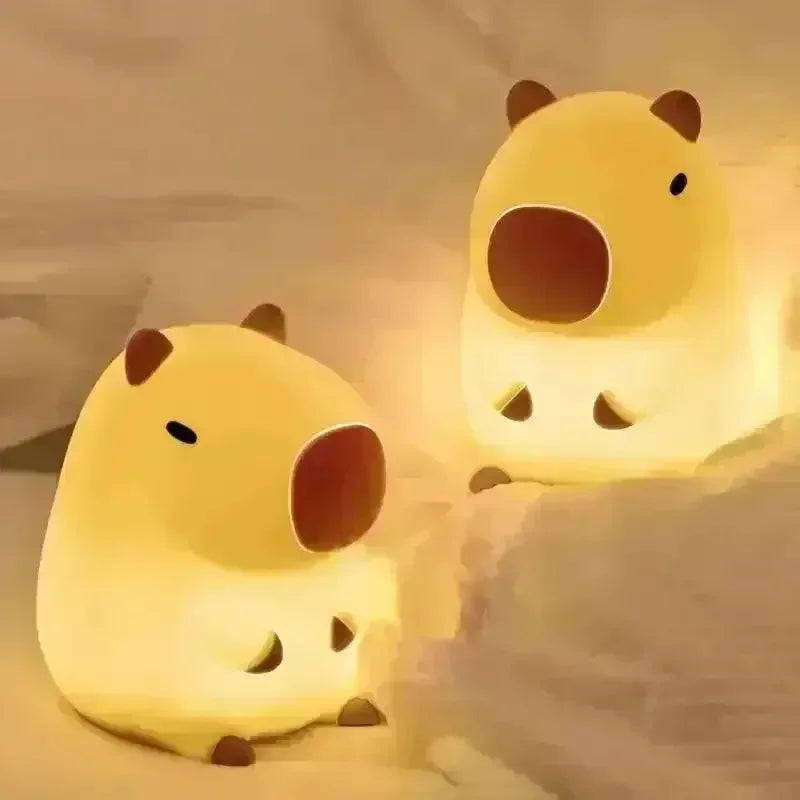https://cdn.shopify.com/s/files/1/0803/3622/4575/files/buy-3d-silicon-capybara-night-lamp-at-bear-hugs-56987.webp?v=1771000275