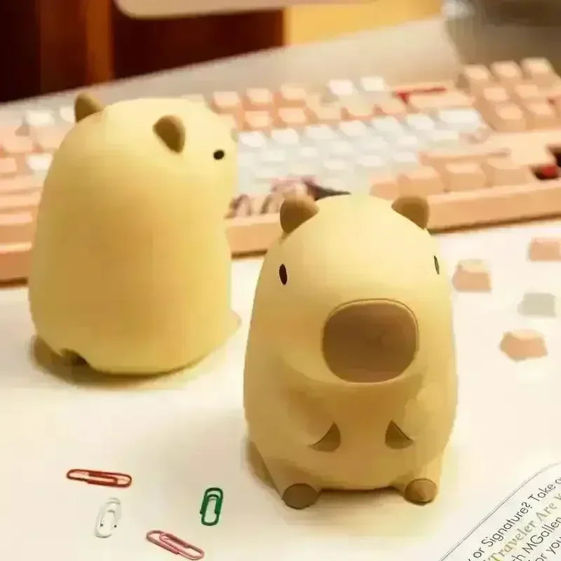 https://cdn.shopify.com/s/files/1/0803/3622/4575/files/buy-3d-silicon-capybara-night-lamp-at-bear-hugs-74957.webp?v=1771000303