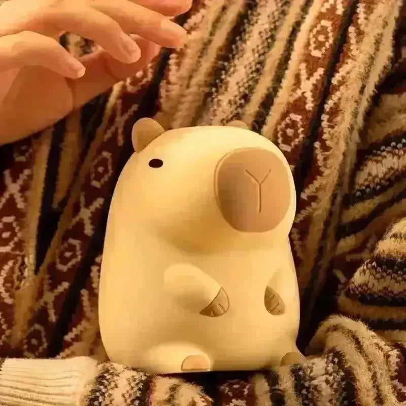 https://cdn.shopify.com/s/files/1/0803/3622/4575/files/buy-3d-silicon-capybara-night-lamp-at-bear-hugs-82343.webp?v=1771000279
